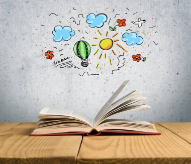 Masanın üzerinde kitabı aç