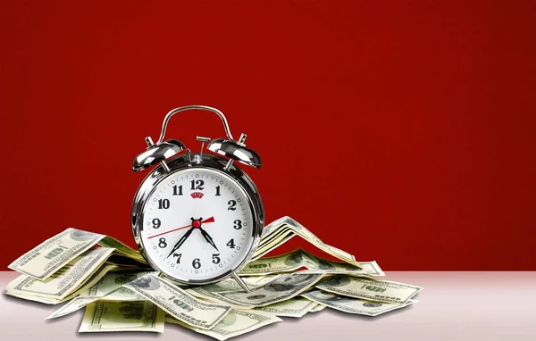 Retro alarm clock and money — Stock Photo, Image