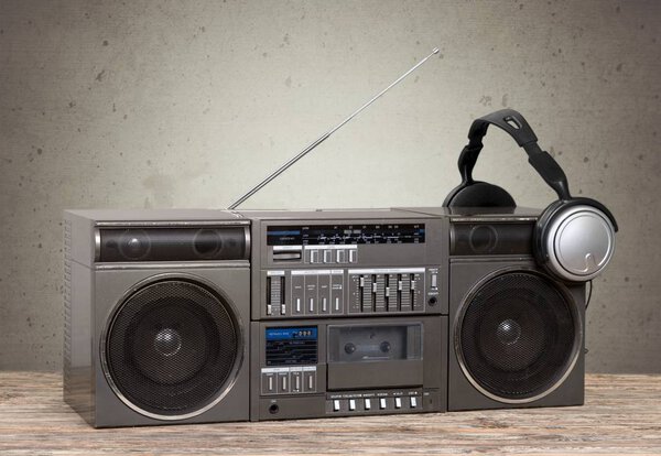 Old retro blaster cassette tape recorder on table