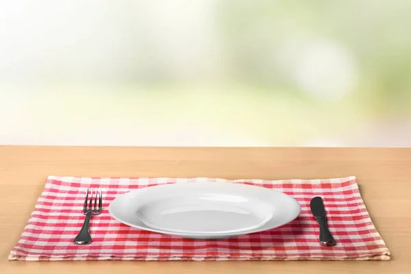 White Plate on napkin — Stock Photo, Image