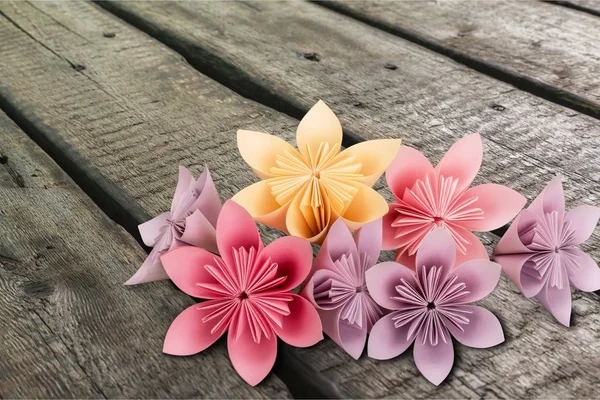 Origami kwiaty na tle — Zdjęcie stockowe