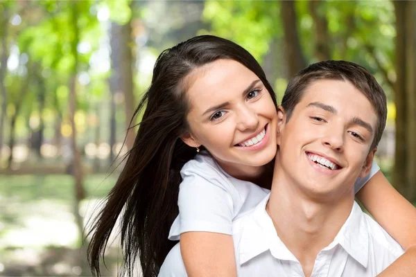 Portrait Happy Young Couple Isolated Blurred Background — Stock Photo, Image