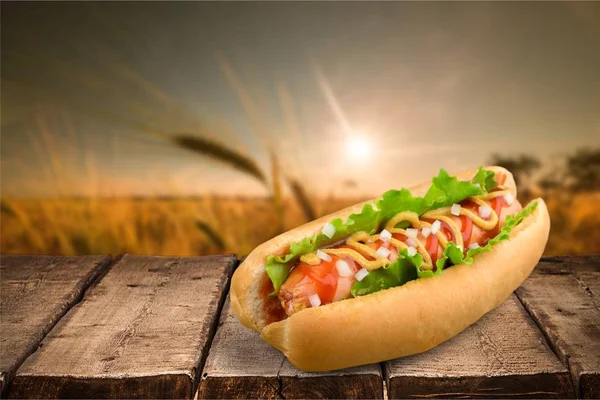 Hot dog with mustard and ketchup — Stock Photo, Image