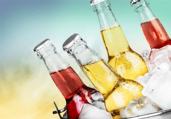 Beer bottles with ice — Stock Photo, Image