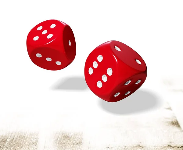 Red dices in midair — Stock Photo, Image