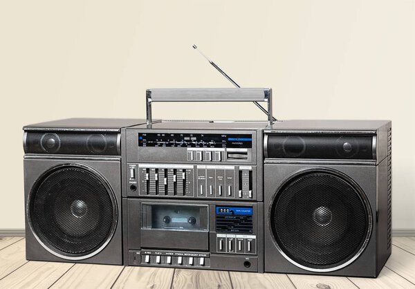 Old retro blaster cassette tape recorder on table