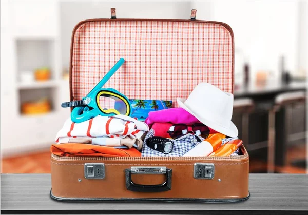 Retro suitcase with travel objects — Stock Photo, Image