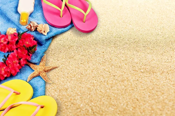 Beach accessories on sand — Stock Photo, Image