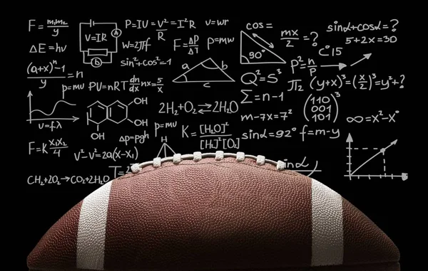 American football ball on chalkboard background