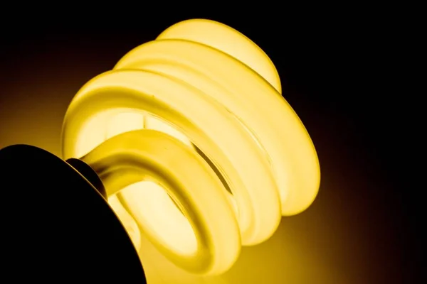 Glowing glass light bulb — Stock Photo, Image