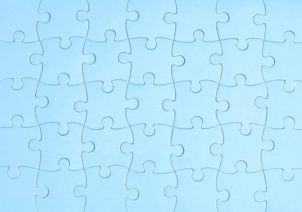 Fitting last puzzle piece — Stock Photo, Image