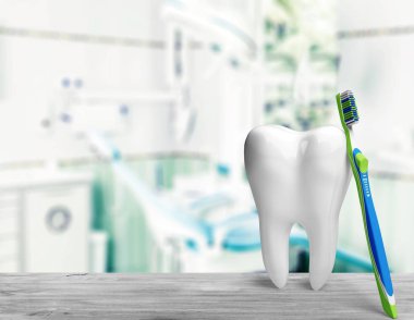 büyük diş modeli ve diş fırçası