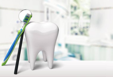 büyük diş modeli ve diş fırçası