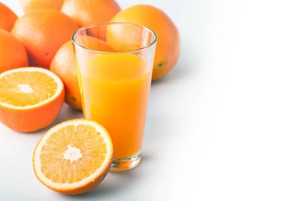 Glass of delicious orange juice — Stock Photo, Image