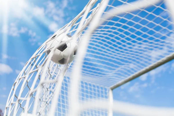 Soccer ball in goal