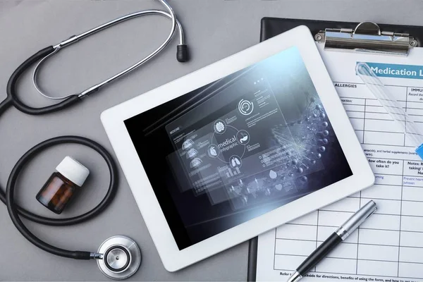 Digital tablet with stethoscope — Stock Photo, Image