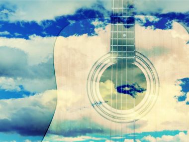 Arka plan üzerinde klasik akustik gitar 