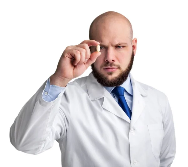 Doctor holding pill — Stock Photo, Image