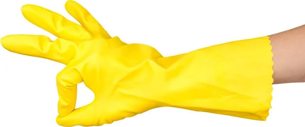 Ruku v rukavici žlutá — Stock fotografie