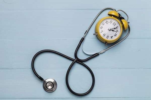 Medical stethoscope on table — Stock Photo, Image