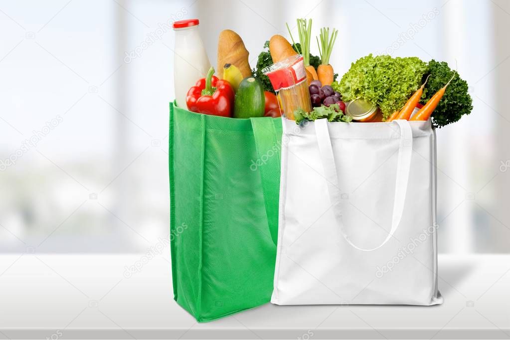 Shopping bags with grocery products