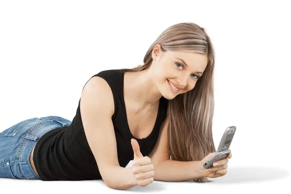 Young woman using phone — Stock Photo, Image