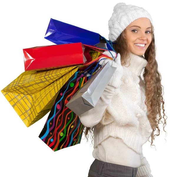 Giovane ragazza con borse di Natale — Foto Stock