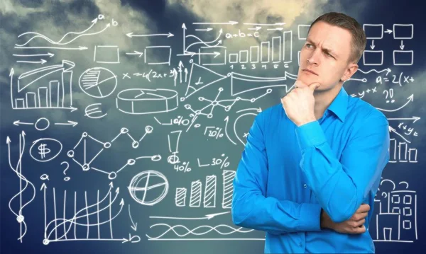 Joven Hombre Reflexivo Camisa Azul Con Signos Fondo —  Fotos de Stock