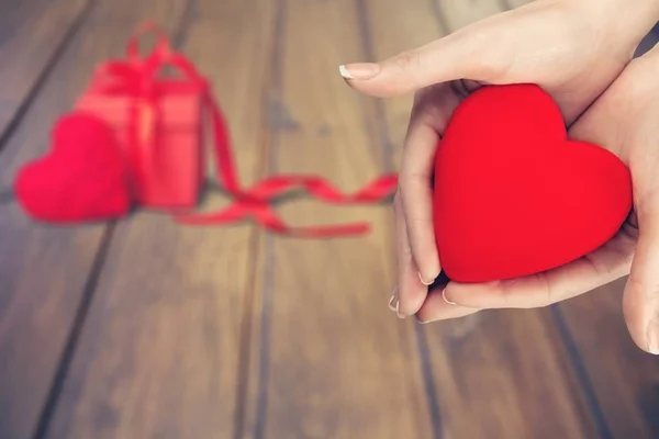 Red Heart in hands — Stock Photo, Image