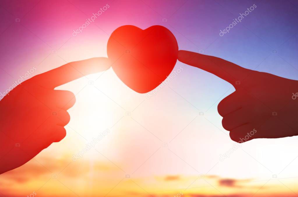 Close-up red Heart in hands, love concept