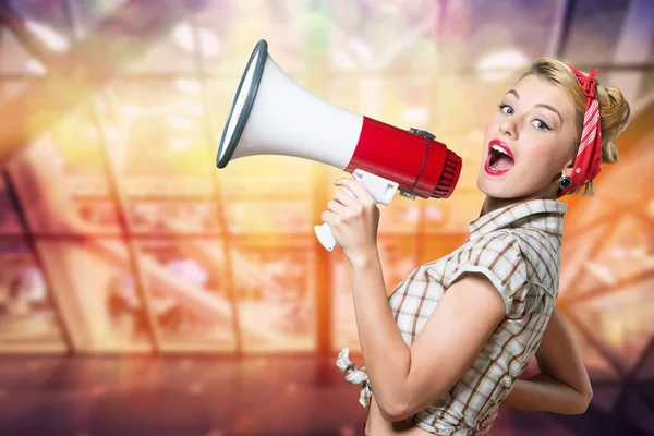 Woman holding megaphone — Stock Photo, Image