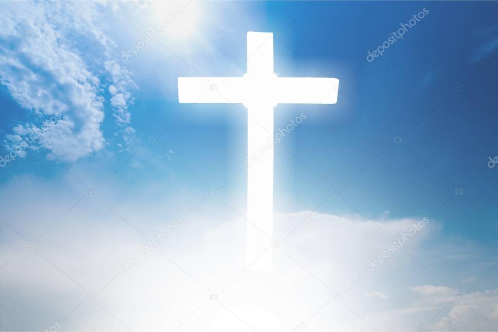 close-up of white cross on blue sky background