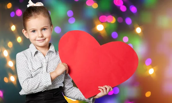 Cute Little Girl Holding Big Red Heart Hands — Stock Photo, Image