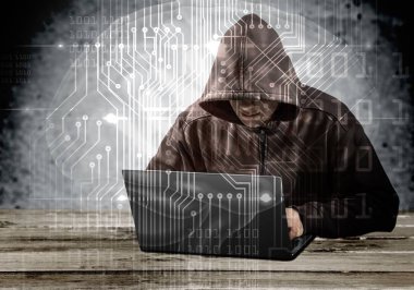 Dizüstü bilgisayar kullanarak Cyber hacker