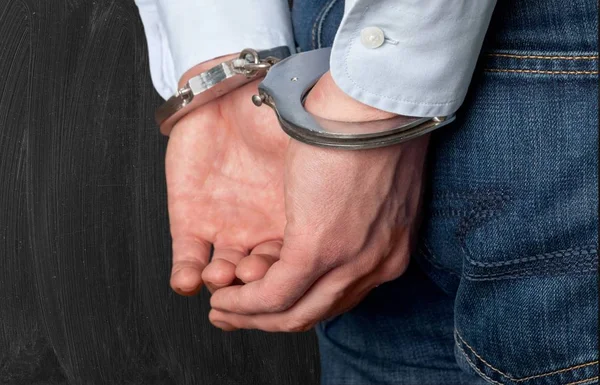 Man Handcuffs His Back — Stock Photo, Image