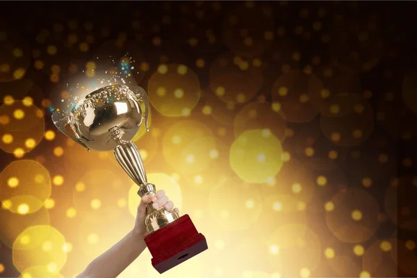 Hand Holding Golden Trophy Blurred Background — Stock Photo, Image