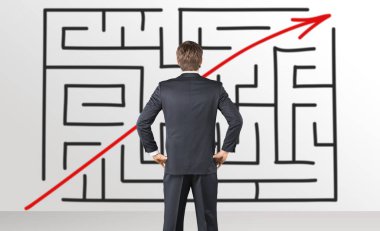 arkadan görünüşü genç iş adamı işaretleri arka plan üzerinde 