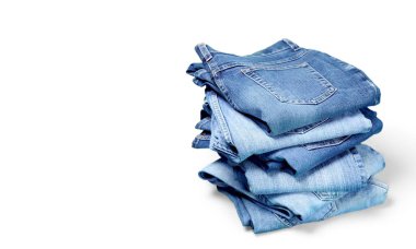 Denim kot arka plan üzerinde yığını 