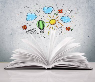 Arka planda izole bir tablo üzerinde açık kitap