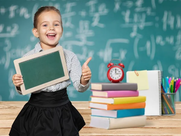 Photo Young Cute Girl Study School Green Chalkboard Background — Stock Photo, Image