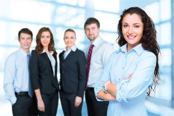 Equipo Gente Negocios Joven Mujer Atractiva Traje Pie Contra Grupo —  Fotos de Stock