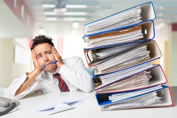 Overworked manager at workplace — Stock Photo, Image