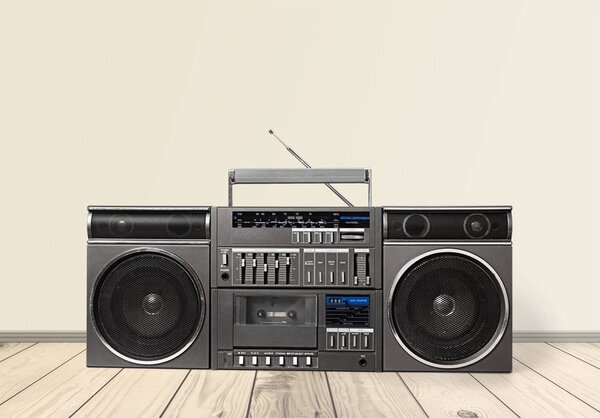 Old retro blaster cassette tape recorder on table