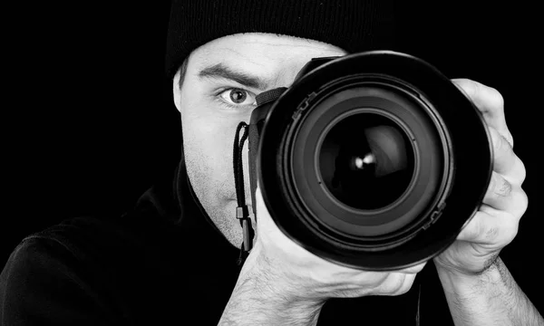 Handsome man with camera — Stock Photo, Image