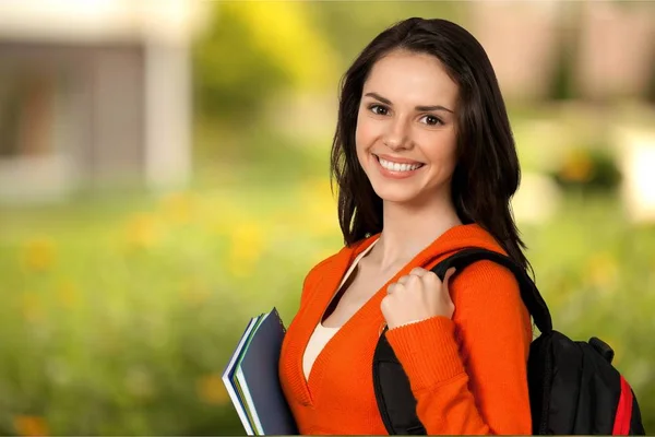 Student girl holding notebooks — Stock Photo, Image