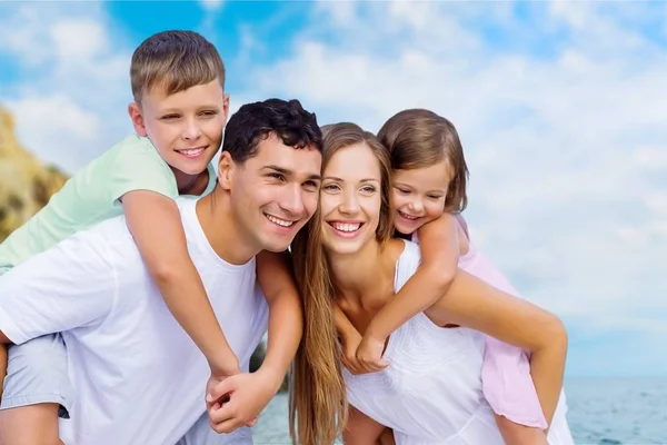 Happy family on vacation — Stock Photo, Image