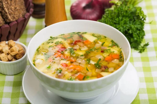 Bowl of vegetables delicious soup — Stock Photo, Image
