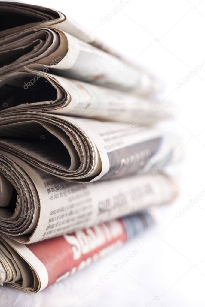 pile of newspapers on  background