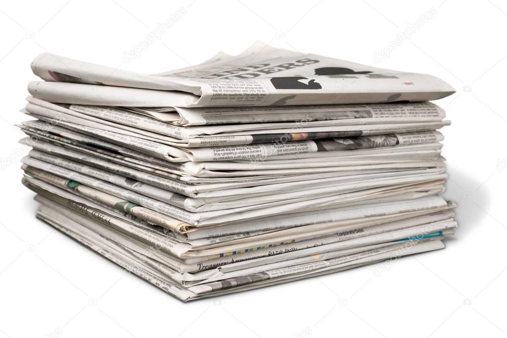 Pile of newspapers on background, close-up view