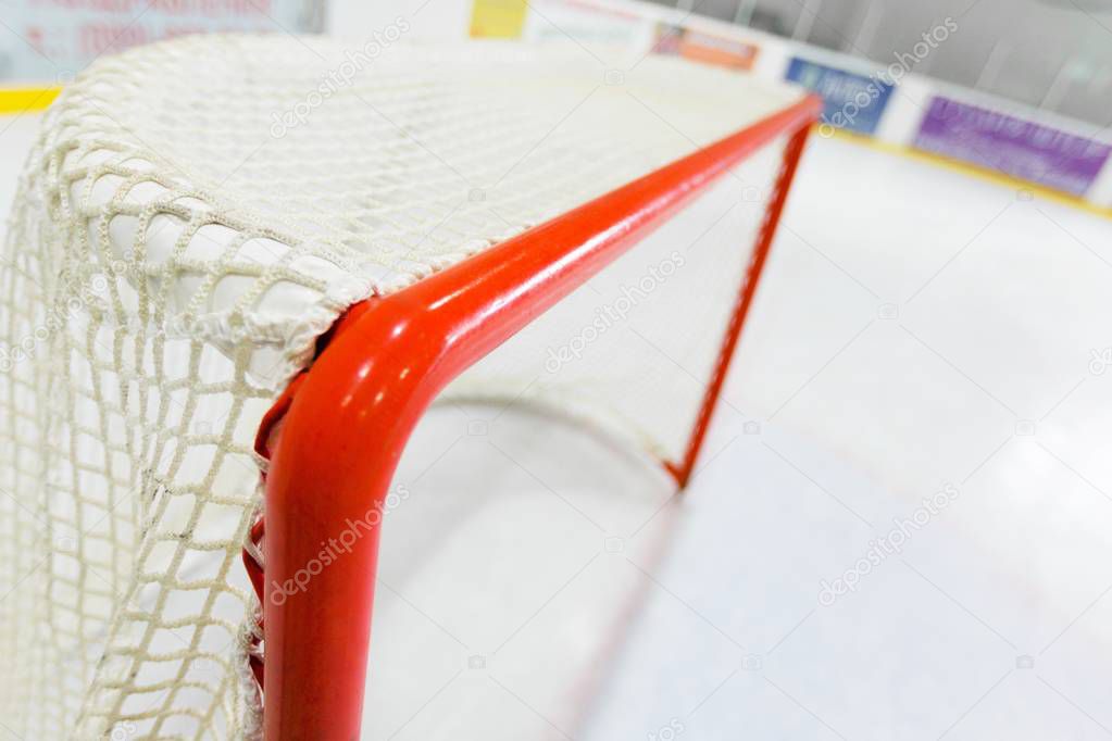 Red hockey goal on background